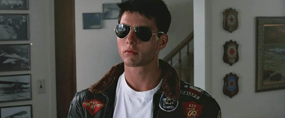Tom Cruise portant les Ray-Ban Aviator Large Metal Classic 3025 dans Top Gun (1986)